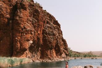 Woman exploring Glen Helen Gorge