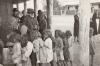 Children lining up for food Source Finke River Mission